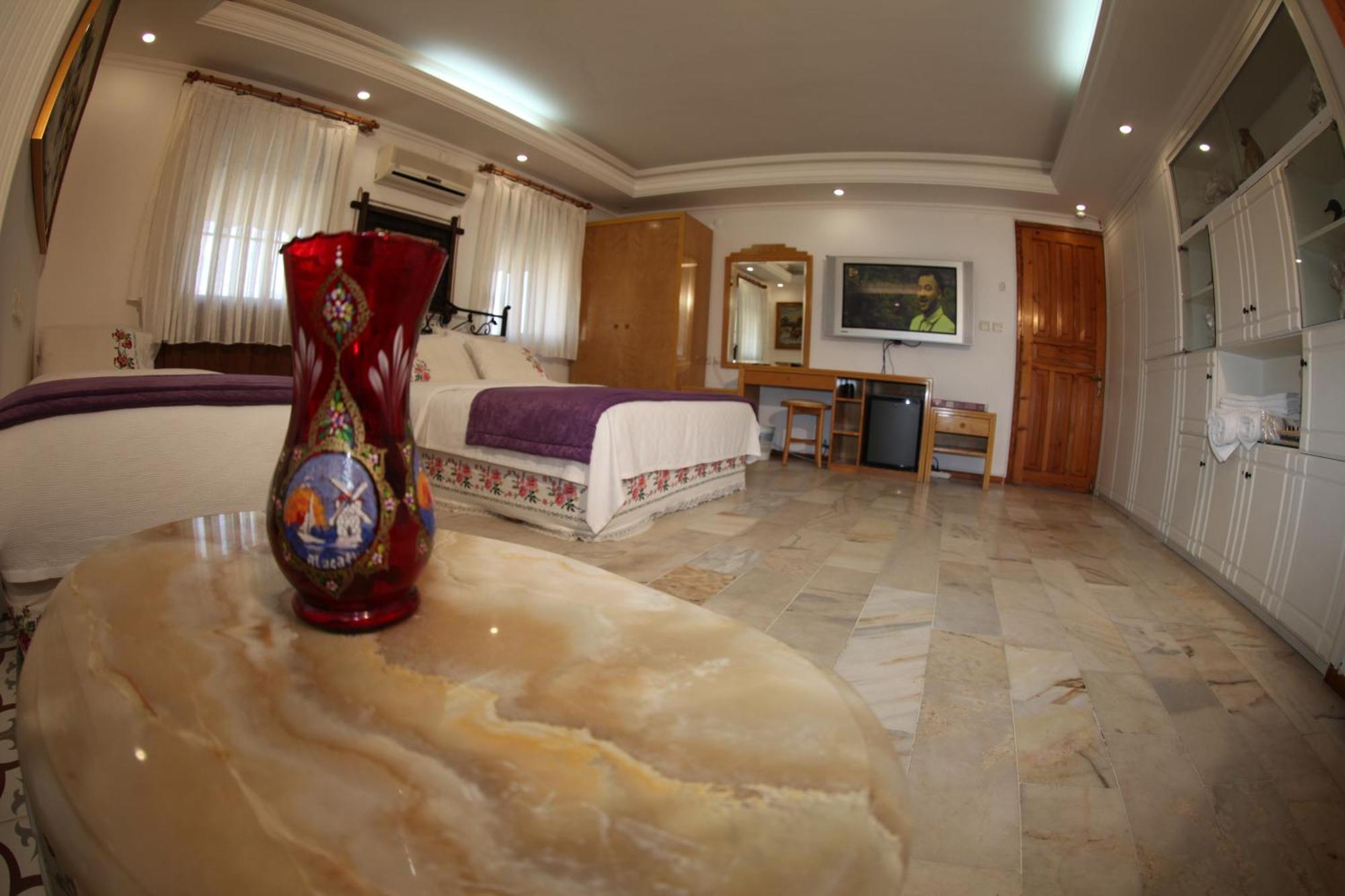 Alacati Antik Motel Кешме Экстерьер фото